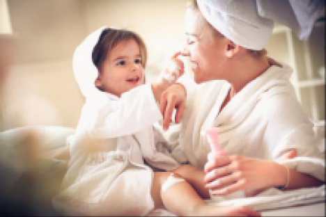 mom and daughter in white rob